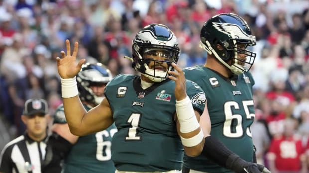 Philadelphia Eagles quarterback Jalen Hurts (1) celebrates after scoring a touchdown against the Kansas City Chiefs during the first quarter in Super Bowl LVII at State Farm Stadium in Glendale on Feb. 12, 2023. Nfl Super Bowl Lvii Kansas City Chiefs Vs Philadelphia Eagles